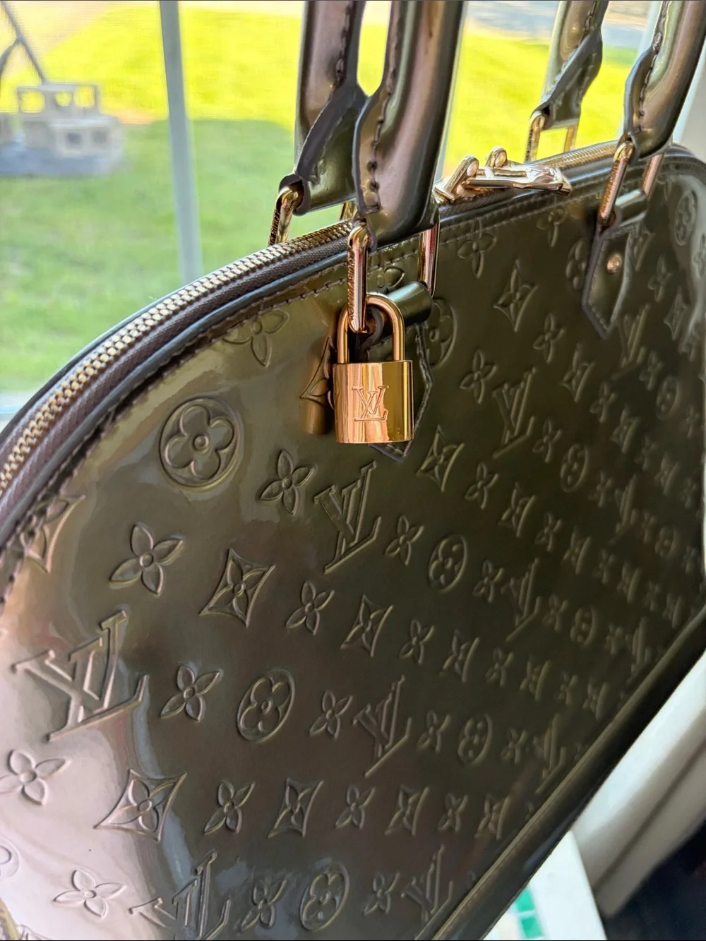 Louis Vuitton Alma large handbag in silver gray monogram patent leather